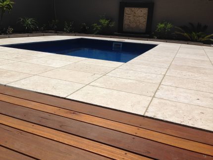 pool surrounds, travertine coping, natural stone for swimming pools, granite pavers, limestone pavers, stone pavers, pool concreting, swimming pool tiling