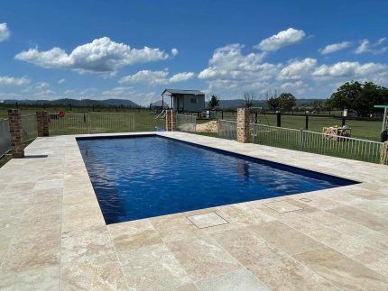 natural stone pavers, outdoor pavers, pool coping, pool surround ideas, pool surrounds, swimming pool tiling, swimming pool paving, paver stones, pool landscaping